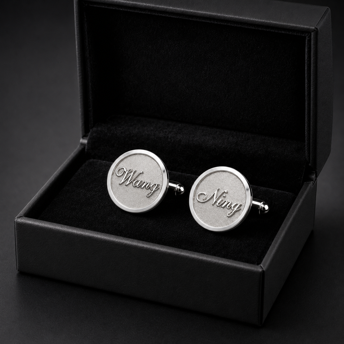 Custom corporate cufflinks presented in a black gift box