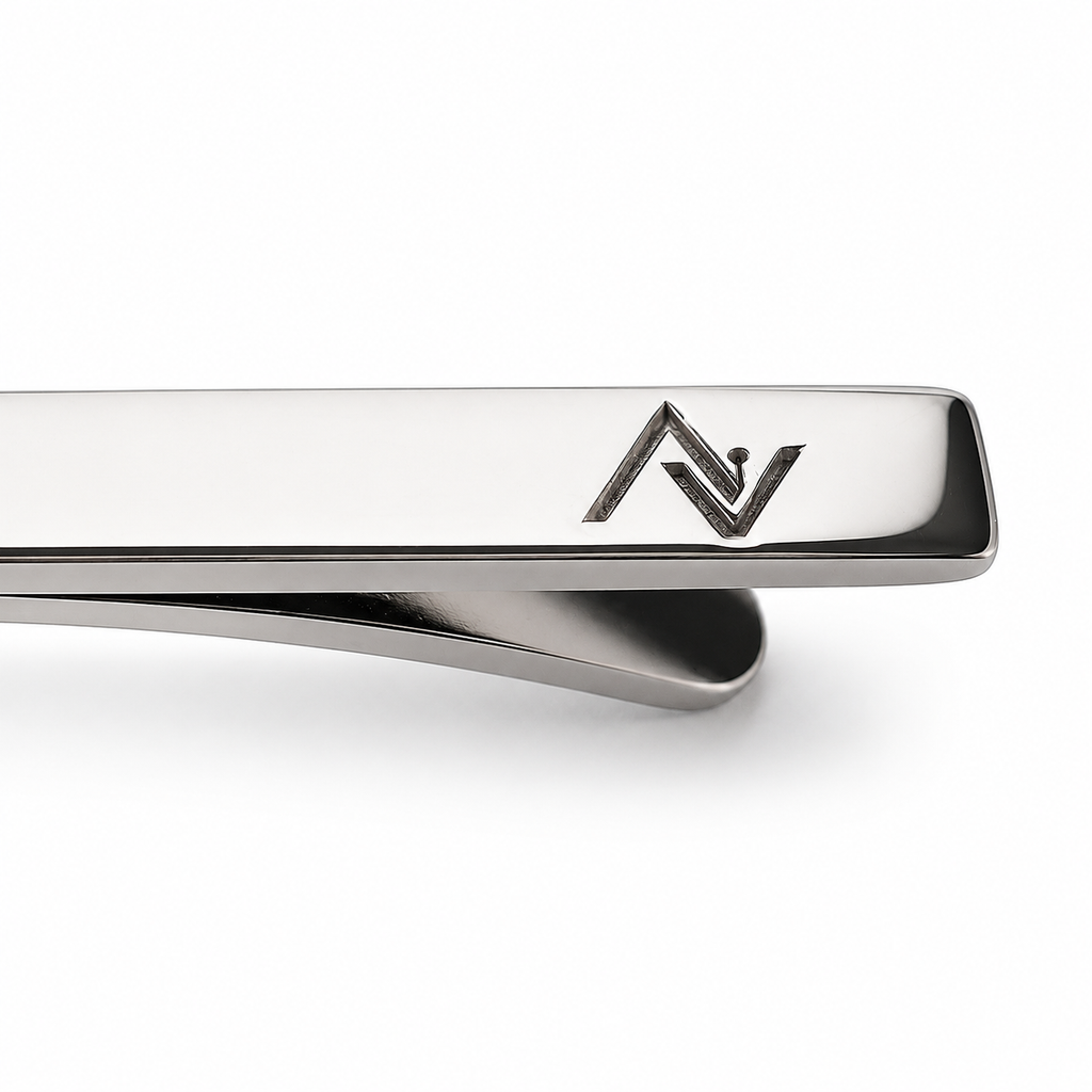 Laser engraved company logo on sterling silver tie clip