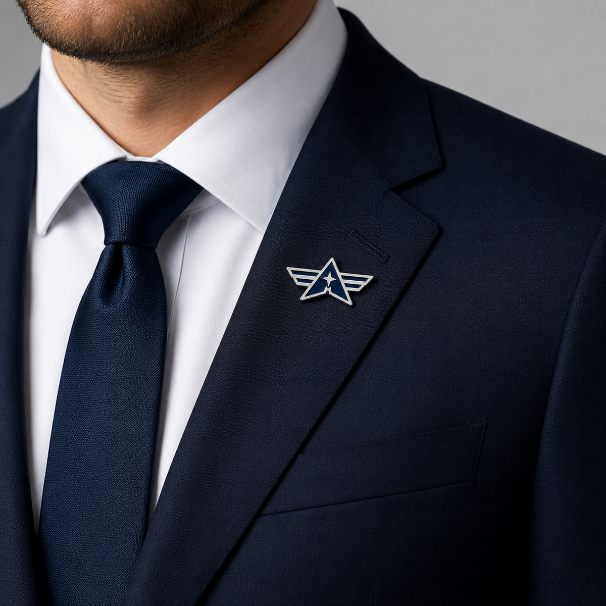 Business suit wearing a custom star wing lapel pin