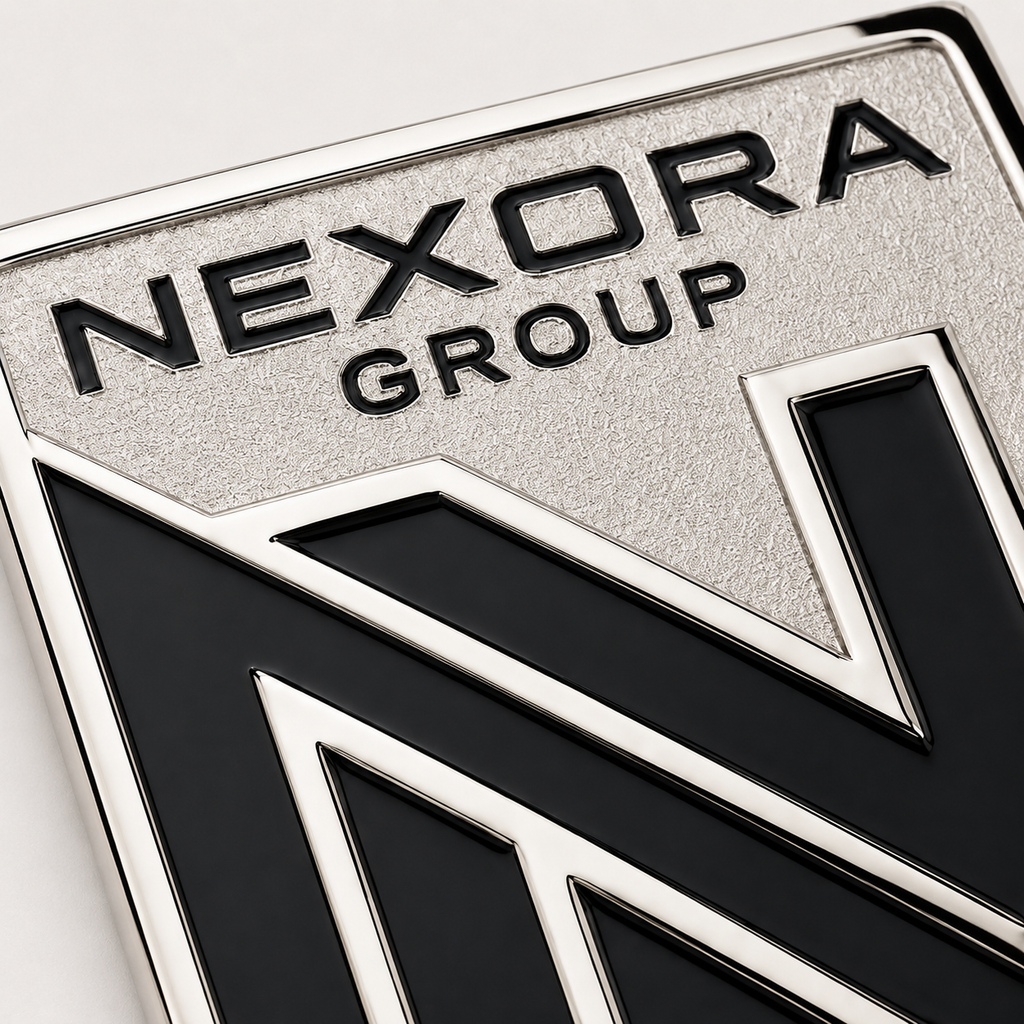 Close-up of polished raised logo on black enamel lapel pin