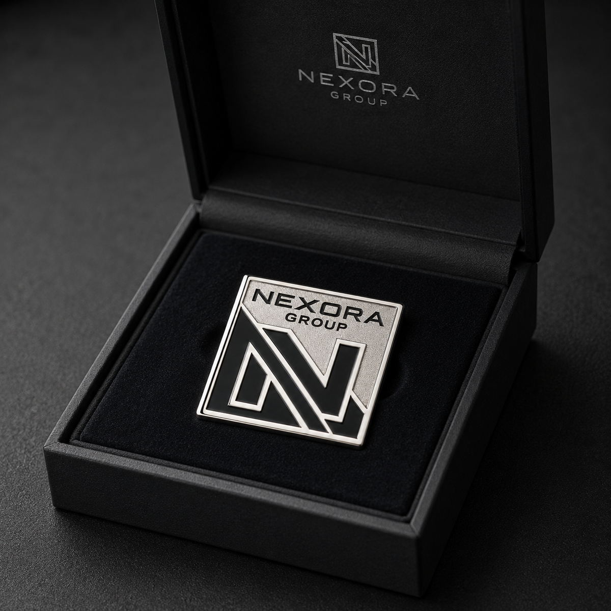 Custom square logo lapel pin presented in a black gift box